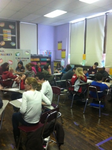 Middle School Students at West Preston sit during a workshop with MFA Students