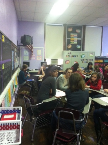 Middle School Students at West Preston sit during a workshop with MFA Students