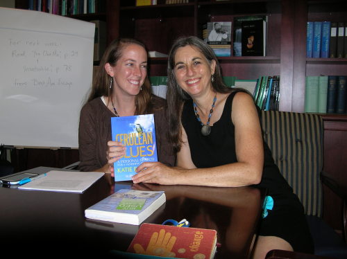Katie Fallon giving Janisse Ray a copy of Cerulean Blues
